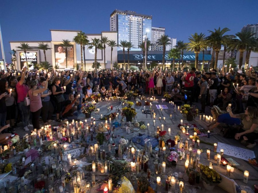 Hundreds gather in a moment of silence on October 8 following the mass shooting 