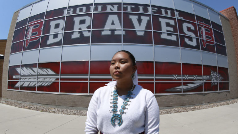 Lemiley Lane, a Bountiful junior who grew up in the Navajo Nation in Arizona, poses for a photograph at Bountiful High School, July 21, 2020, in Bountiful, Utah. While advocates have made strides in getting Native American symbols and names changed in sports, they say theres still work to do mainly at the high school level, where mascots like Braves, Indians, Warriors, Chiefs and Redskins persist. (AP Photo/Rick Bowmer)