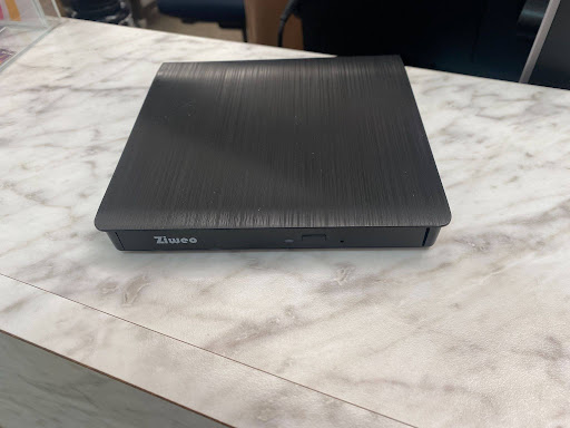 A DVD player that teachers use to play DVDs; Photo by Derryck Zitting